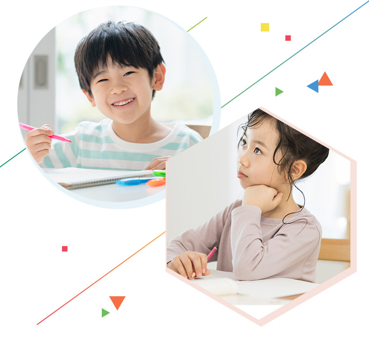 楽しく勉強をする小学生の男の子と授業を聞く女の子